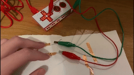 accidental button with conductive thread
